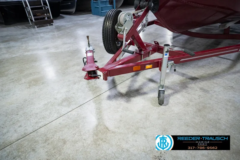 Slide: The Image of 2017 Lund 1650 Rebel XS SS boat trailer in a garage setting. - 60