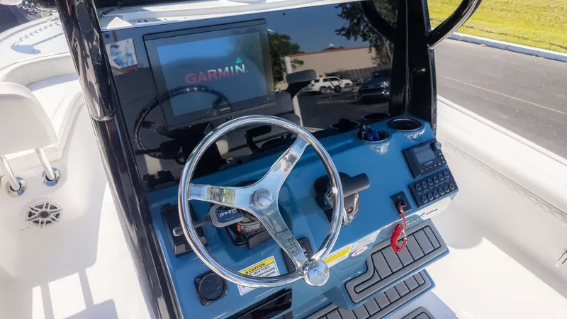 Slide: The Image of 2026 Tidewater 2500 Carolina Bay helm with Garmin navigation system. - 11
