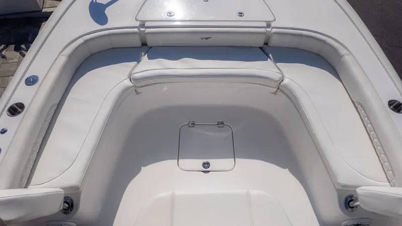 Slide: The Image of Interior of 2026 Tidewater 2500 Carolina Bay with white upholstery. - 16