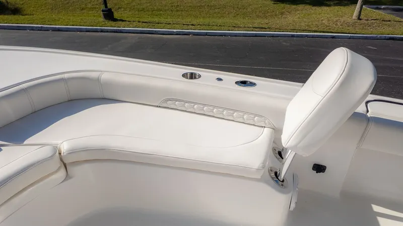 Slide: The Image of 2026 Tidewater 2500 Carolina Bay boat with white seating area. - 17