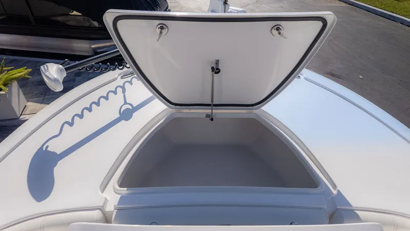 Slide: The Image of Open storage compartment on 2026 Tidewater 2500 Carolina Bay boat. - 22
