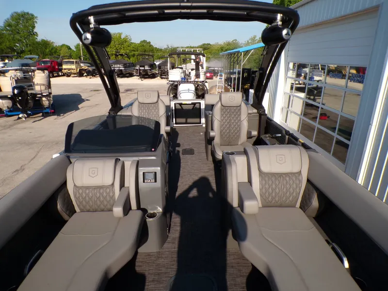 Slide: The Image of Interior of 2026 GODFREY TRITOONS SanPan 2700 with luxurious seating. - 11