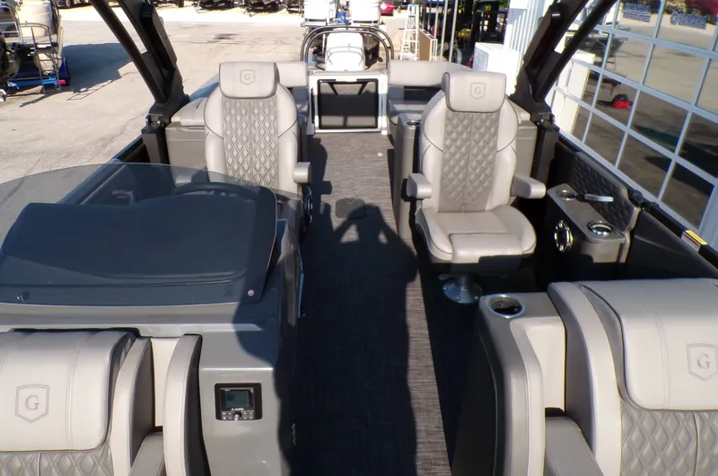 Slide: The Image of Interior of 2026 GODFREY TRITOONS SanPan 2700 with luxurious seating. - 12