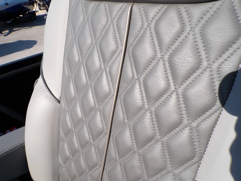 Slide: The Image of Luxurious gray leather seat with diamond pattern, Godfrey Tritoons SanPan 2700, 2026. - 17