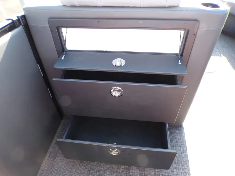 Slide: The Image of Interior of GODFREY TRITOONS SanPan 2700 with open drawers, year 2026. - 19