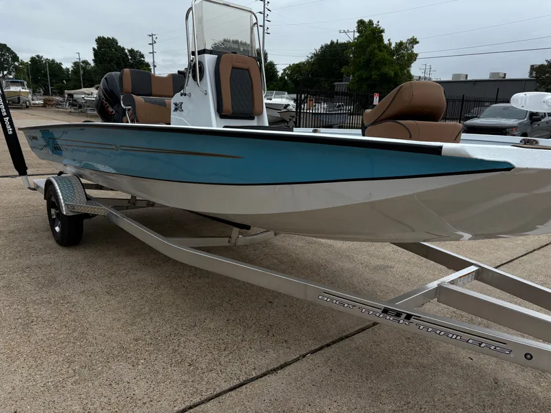 Slide: The Image of 2026 Xpress H20B Hyper-Lift Bay boat on trailer. - 3