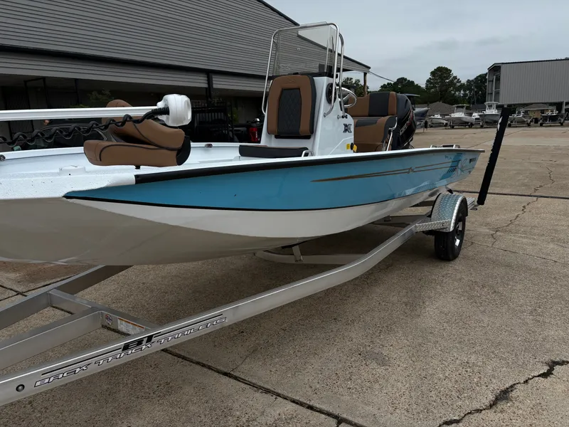 Slide: The Image of 2026 Xpress H20B Hyper-Lift Bay boat on trailer. - 4