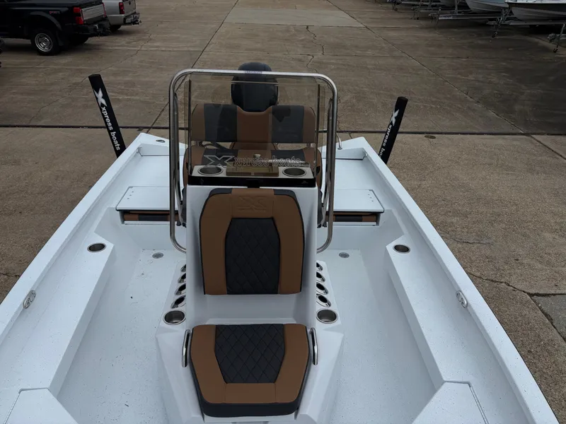 Slide: The Image of 2026 Xpress H20B Hyper-Lift Bay boat with modern seating. - 7