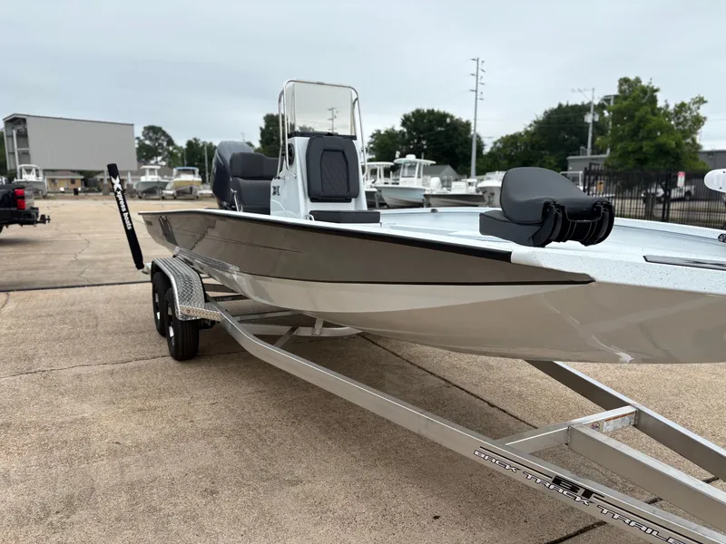 Slide: The Image of 2026 Xpress H22B Hyper-Lift Bay boat on trailer. - 4