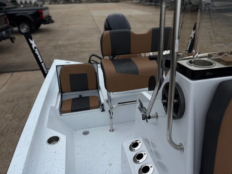 Slide: The Image of 2026 Xpress H20B HYPERLIFT-BAY boat interior with seating. - 8