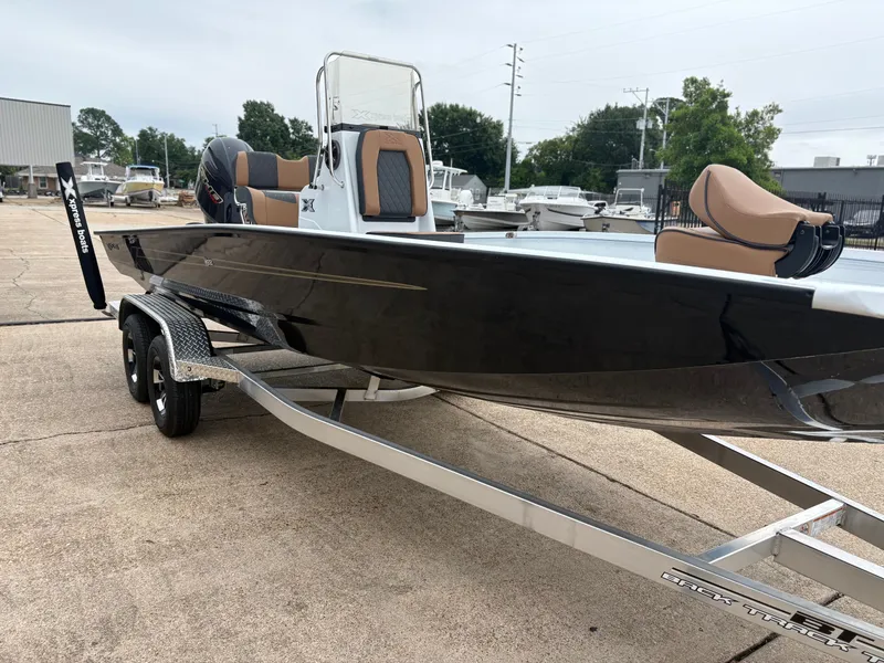 Slide: The Image of 2026 Xpress H22B Hyper-Lift Bay boat on trailer. - 4