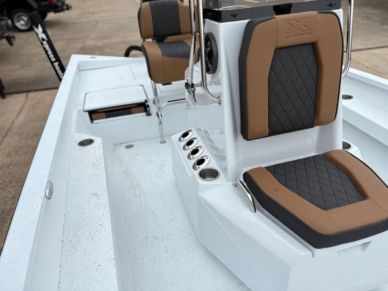 Slide: The Image of Interior of 2026 Xpress H22B HYPER-LIFT BAY with cushioned seats. - 8