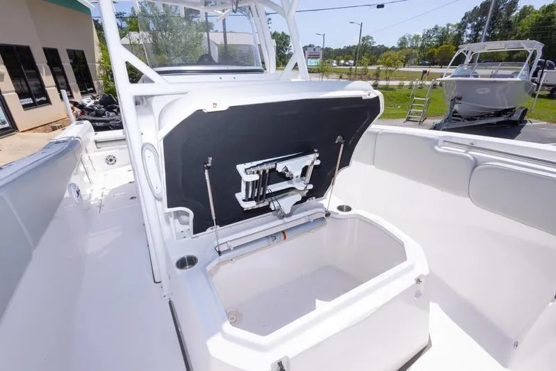 Slide: The Image of 2023 Sea Fox 288 Commander boat interior with open storage compartment. - 18