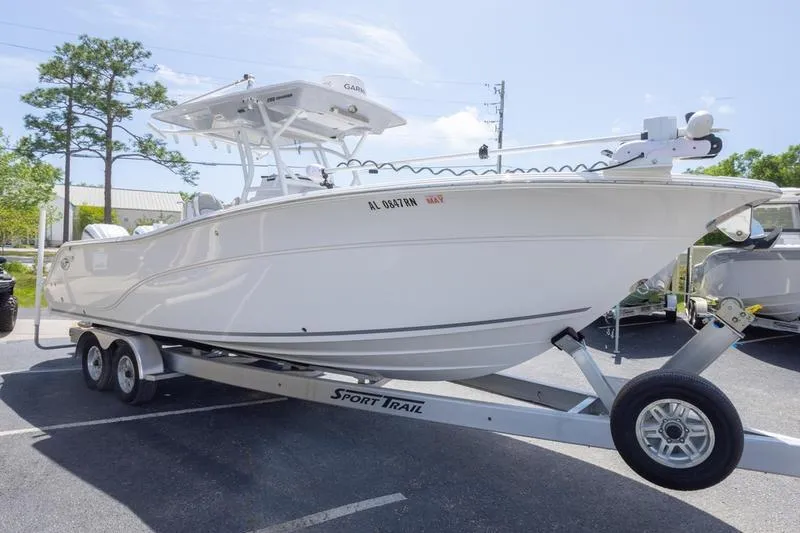 Slide: The Image of 2023 Sea Fox 288 Commander boat on trailer in parking lot. - 2