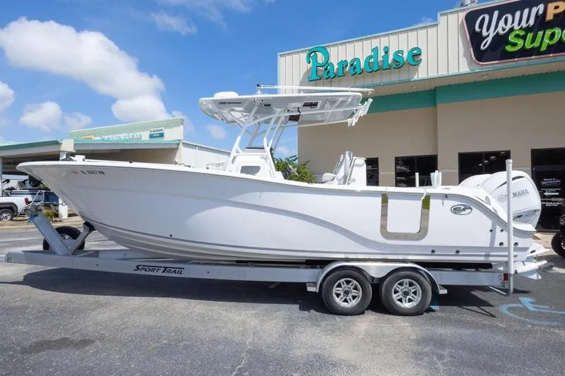 Slide: The Image of 2023 Sea Fox 288 Commander boat on trailer outside Paradise store. - 5