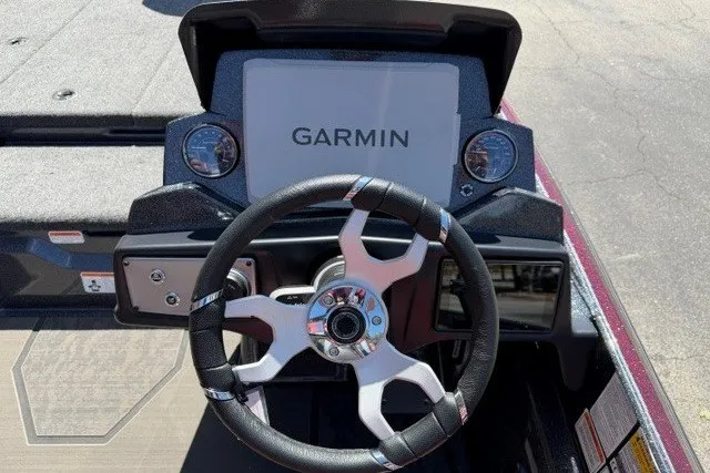 Slide: The Image of Steering wheel and Garmin display on 2026 Nitro Z21 XL Pro boat dashboard. - 8