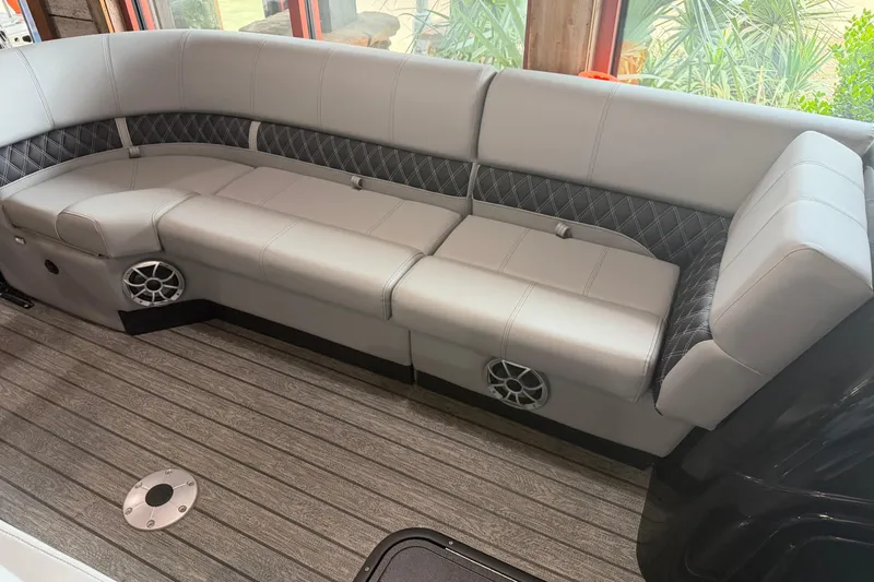 Slide: The Image of Luxurious seating in 2026 Ranger 223FC boat with stylish upholstery and integrated speakers. - 11