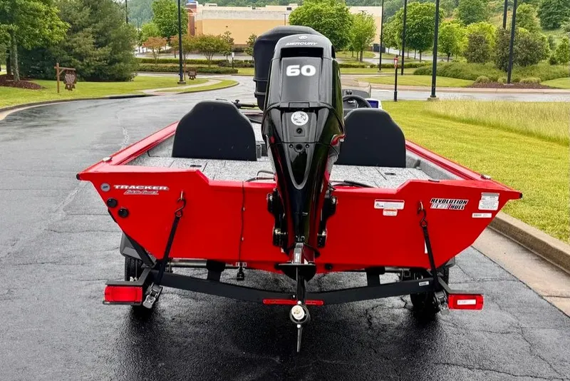 Slide: The Image of 2026 Tracker Pro Team 175 boat with Mercury 60 engine on a road. - 5
