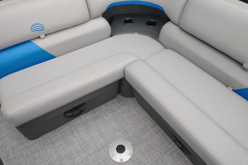 Slide: The Image of 2026 Sun Tracker Party Barge 20 DLX interior seating with cup holders and modern design. - 3