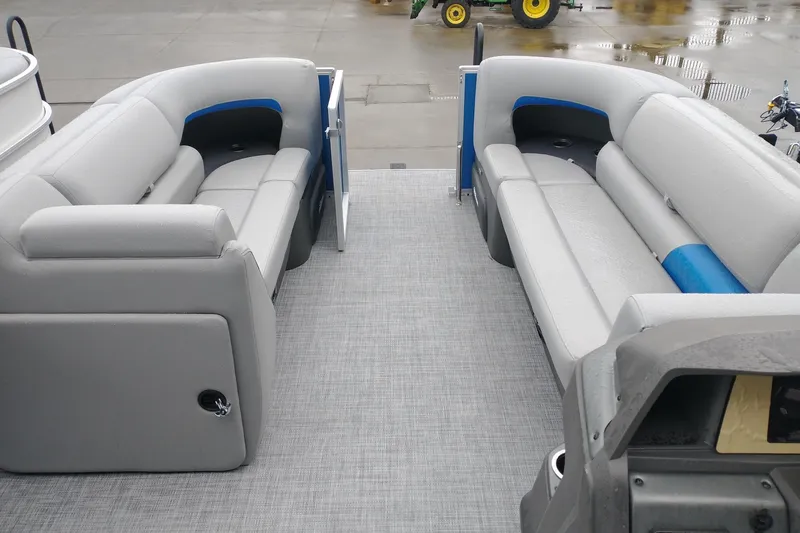 Slide: The Image of 2026 Sun Tracker Party Barge 20 DLX interior with gray seating and spacious layout. - 5