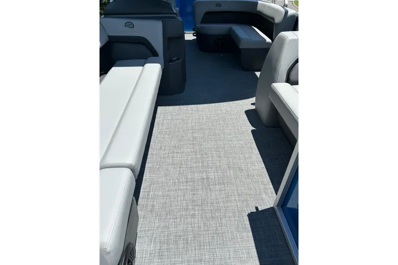 Slide: The Image of 2026 Sun Tracker Party Barge 18 DLX interior with spacious seating and modern design. - 6