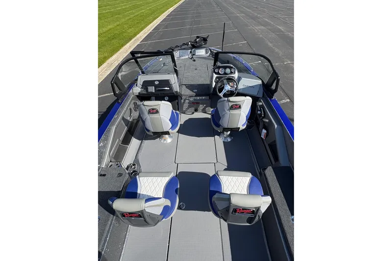 Slide: The Image of 2026 Ranger 621FS Cup-Equipped boat interior with four seats and modern dashboard. - 5