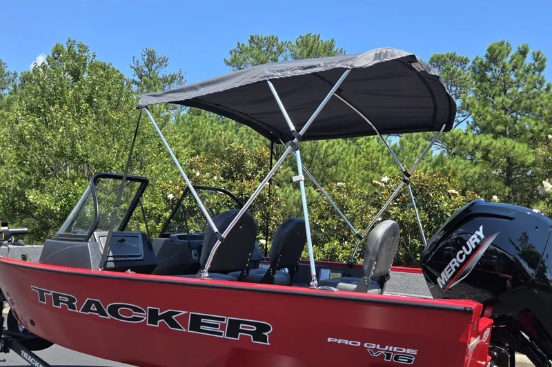 The Image of 2026 Tracker Pro Guide V-16 WT boat with canopy and Mercury engine. - 0