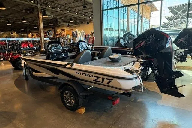 The Image of 2026 Nitro Z17 boat displayed in a showroom with modern interior and powerful engine. - 0