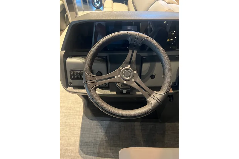 Slide: The Image of Steering wheel of 2026 Sun Tracker Party Barge 20 DLX pontoon boat. - 14