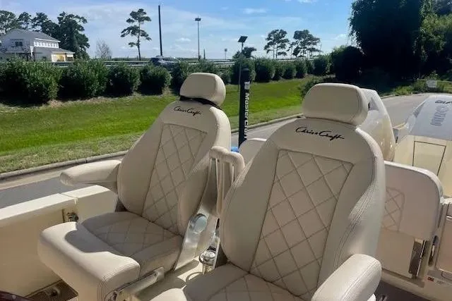 Slide: The Image of 2024 Chris-Craft Catalina 30 boat seats with elegant diamond stitching design. - 19