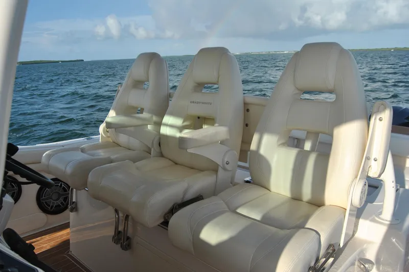 Slide: The Image of 2018 Grady-White Canyon 376 boat seats with ocean view in background. - 11