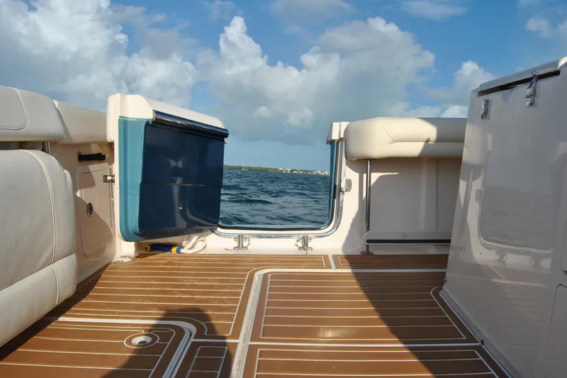 Slide: The Image of 2018 Grady-White Canyon 376 boat interior with open deck and ocean view. - 12