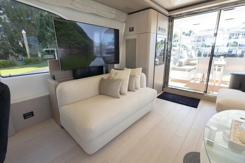Slide: The Image of Luxurious interior of 2021 Azimut Fly 72 yacht with modern decor and large windows. - 17