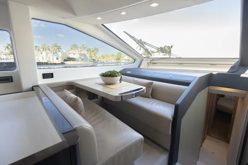 Slide: The Image of Luxurious interior of 2021 Azimut Fly 72 yacht with elegant seating and table. - 20
