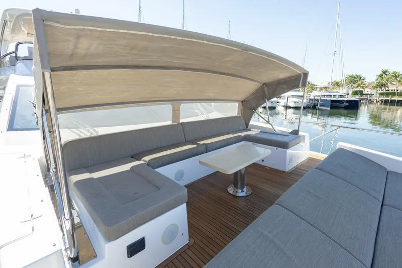 Slide: The Image of Luxurious 2021 Azimut Fly 72 yacht with spacious outdoor seating and canopy. - 64