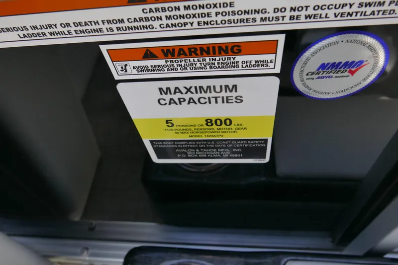 Slide: The Image of 2024 Avalon Venture Bow Fish 1575 capacity label, warning, and certification details. - 11
