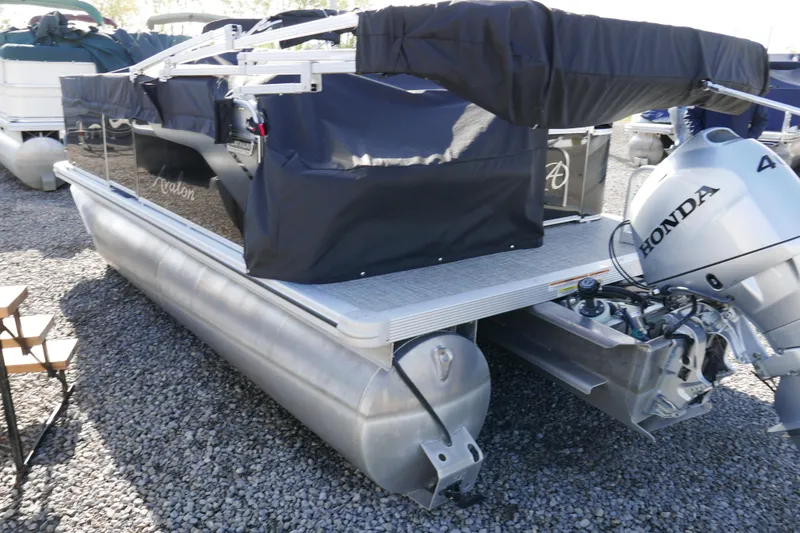 Slide: The Image of 2024 Avalon Venture Bow Fish 1575 pontoon boat with Honda outboard motor. - 15