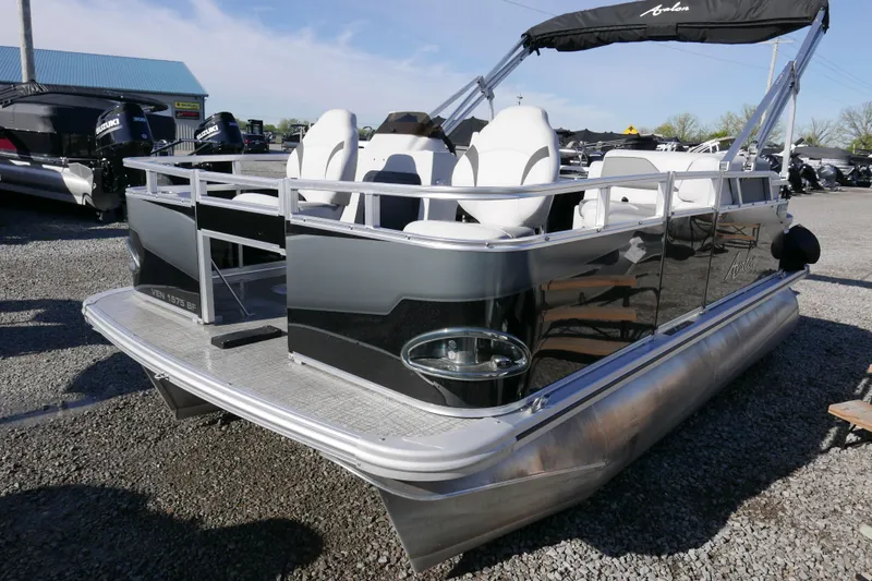 Slide: The Image of 2024 Avalon Venture Bow Fish 1575 pontoon boat with sleek design and comfortable seating. - 2
