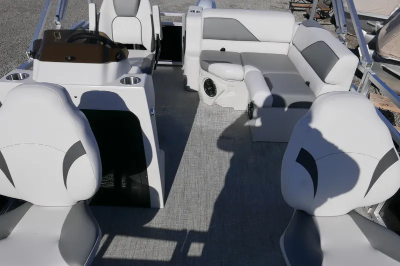 Slide: The Image of 2024 Avalon Venture Bow Fish 1575 interior with modern seating and steering console. - 3