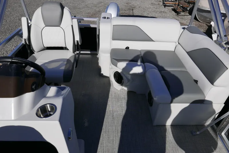 Slide: The Image of 2024 Avalon Venture Bow Fish 1575 interior with gray seating and steering console. - 6