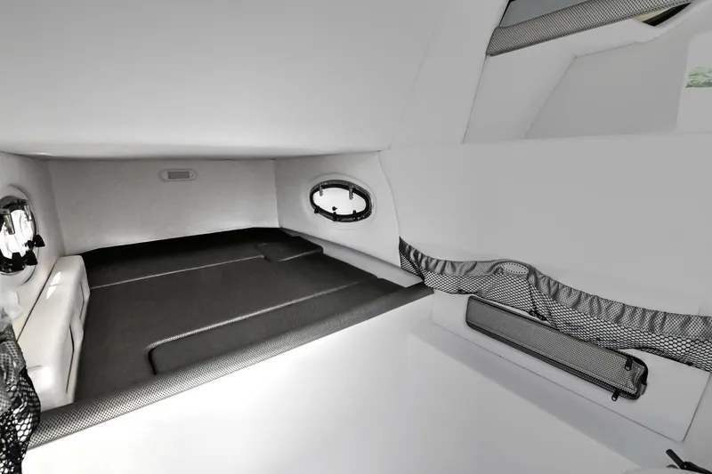 Slide: The Image of 2020 Nor-Tech 340 Sport cabin interior with sleek design and comfortable sleeping area. - 28