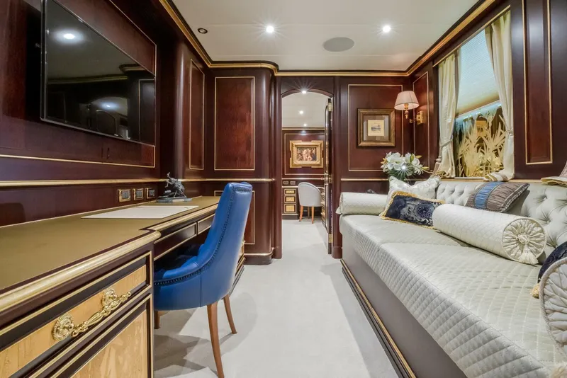Slide: The Image of Luxurious interior of 2009 Horizon Model Tri-Deck yacht with elegant wood paneling and plush seating. - 15