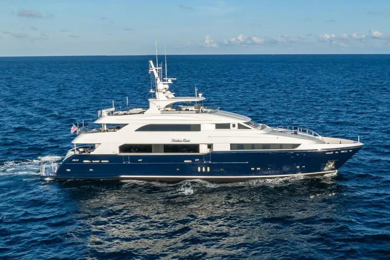 Slide: The Image of Luxurious 2009 Horizon Model Tri-Deck yacht cruising on open sea. - 2