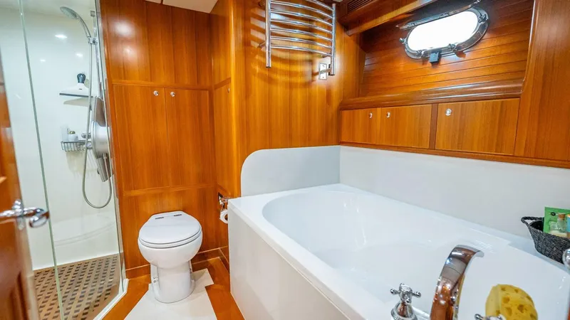 Slide: The Image of Luxurious bathroom in 2009 Nordhavn 76 yacht with wood paneling and modern fixtures. - 22