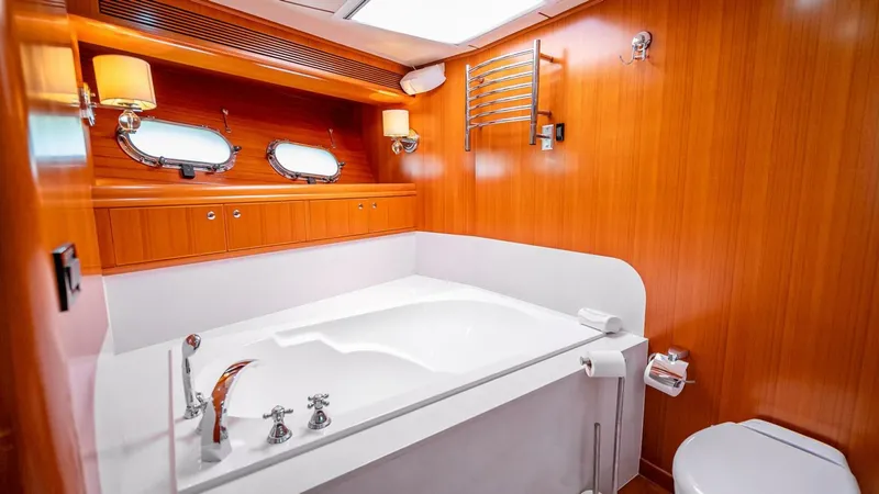 Slide: The Image of Luxurious bathroom in 2009 Nordhavn 76 yacht with wood paneling and modern fixtures. - 36