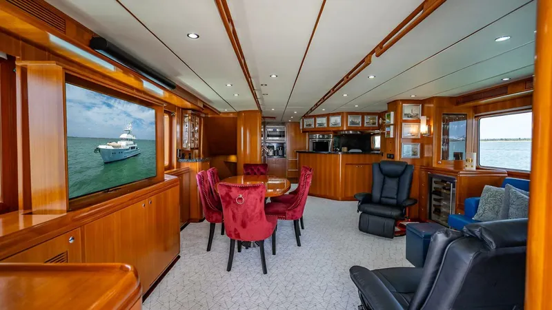 Slide: The Image of Luxurious interior of 2009 Nordhavn 76 yacht with elegant wood finishes and plush seating. - 8