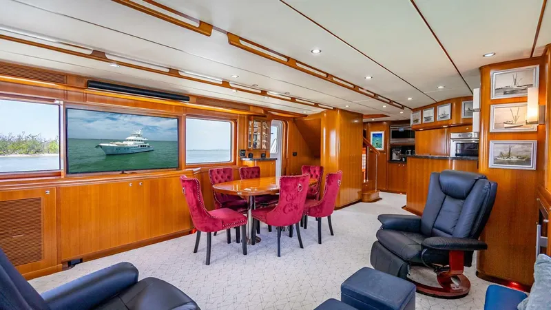 Slide: The Image of Luxurious interior of 2009 Nordhavn 76 yacht with elegant seating and wood paneling. - 9