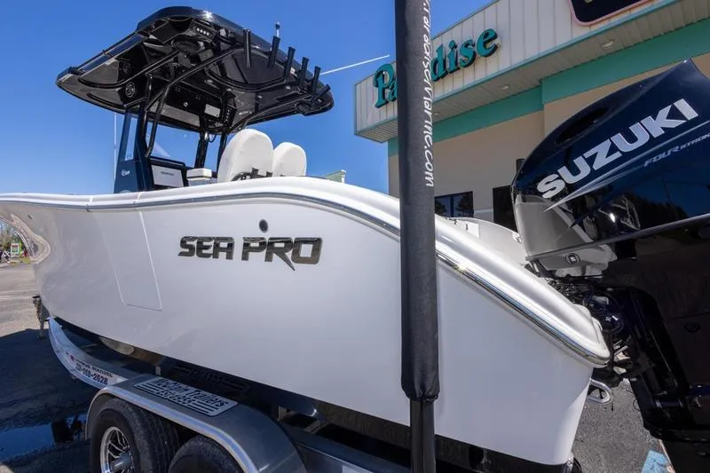 Slide: The Image of 2025 Sea Pro 262 Offshore boat with Suzuki engine at Paradise dealership. - 15