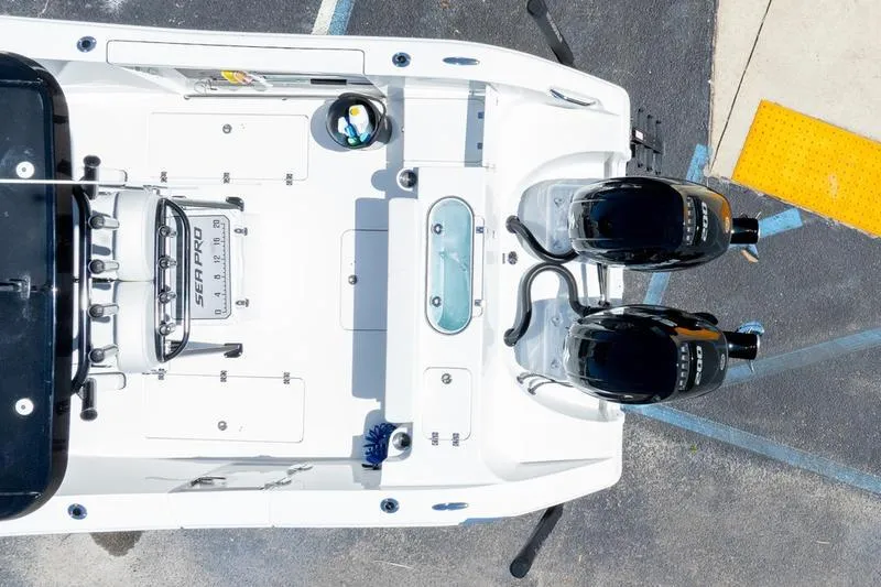 Slide: The Image of Overhead view of 2025 Sea Pro 262 Offshore boat with dual engines. - 18