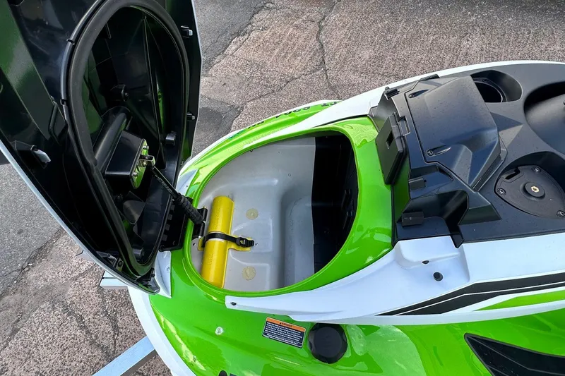 Slide: The Image of Green 2021 Yamaha WaveRunner FX Cruiser HO with open storage compartment. - 11